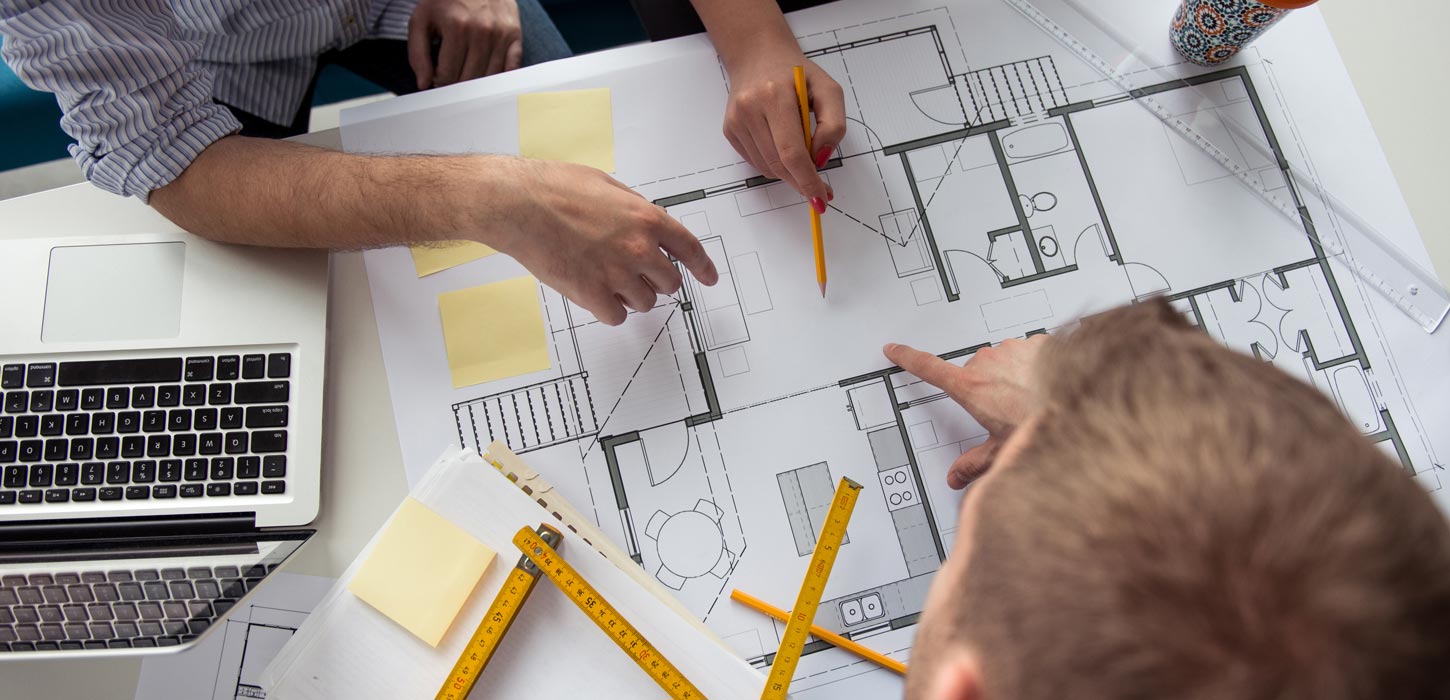 Group Going Over Blueprints